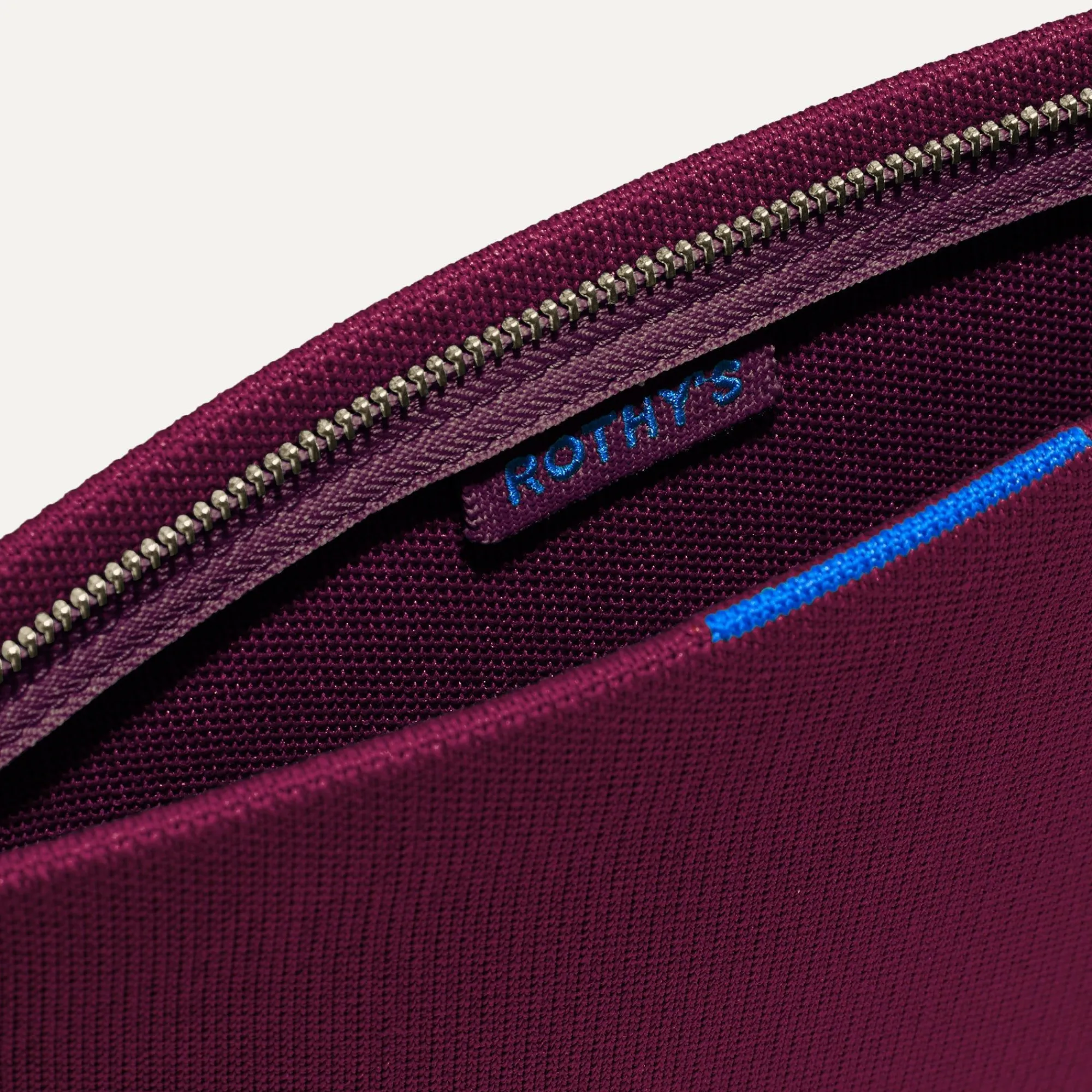 Rothy's Clutches & Pouches^The Wristlet Collegiate Currant