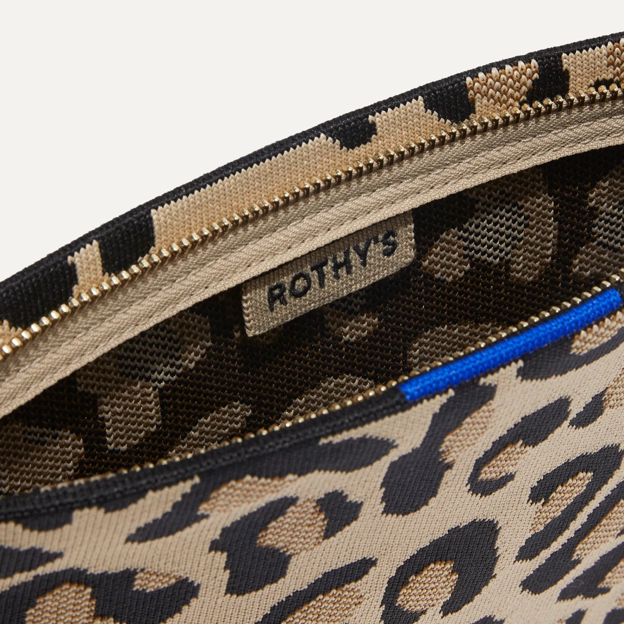 Rothy's Clutches & Pouches^The Wristlet Desert Cat