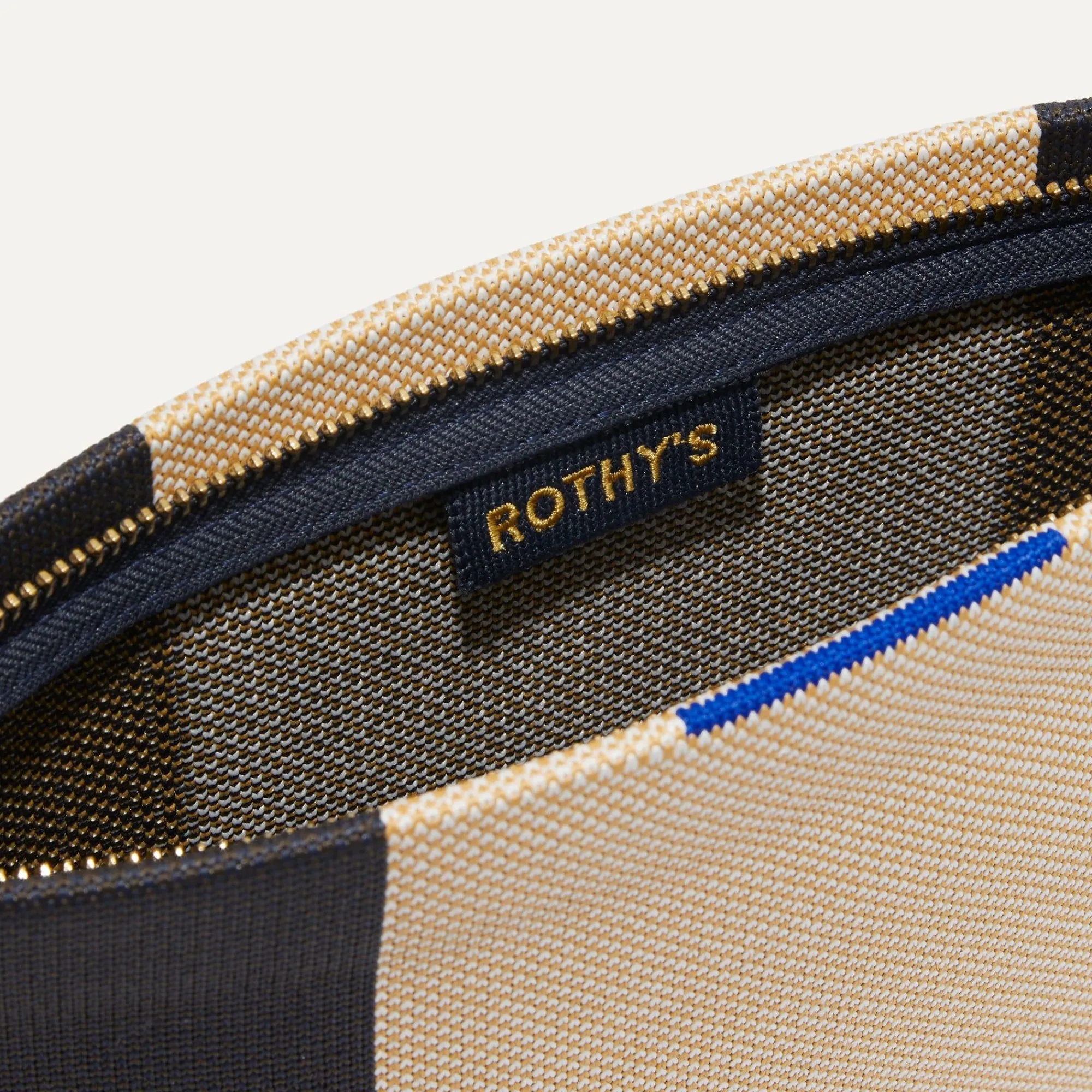 Rothy's Clutches & Pouches^The Wristlet Ink And Ivory