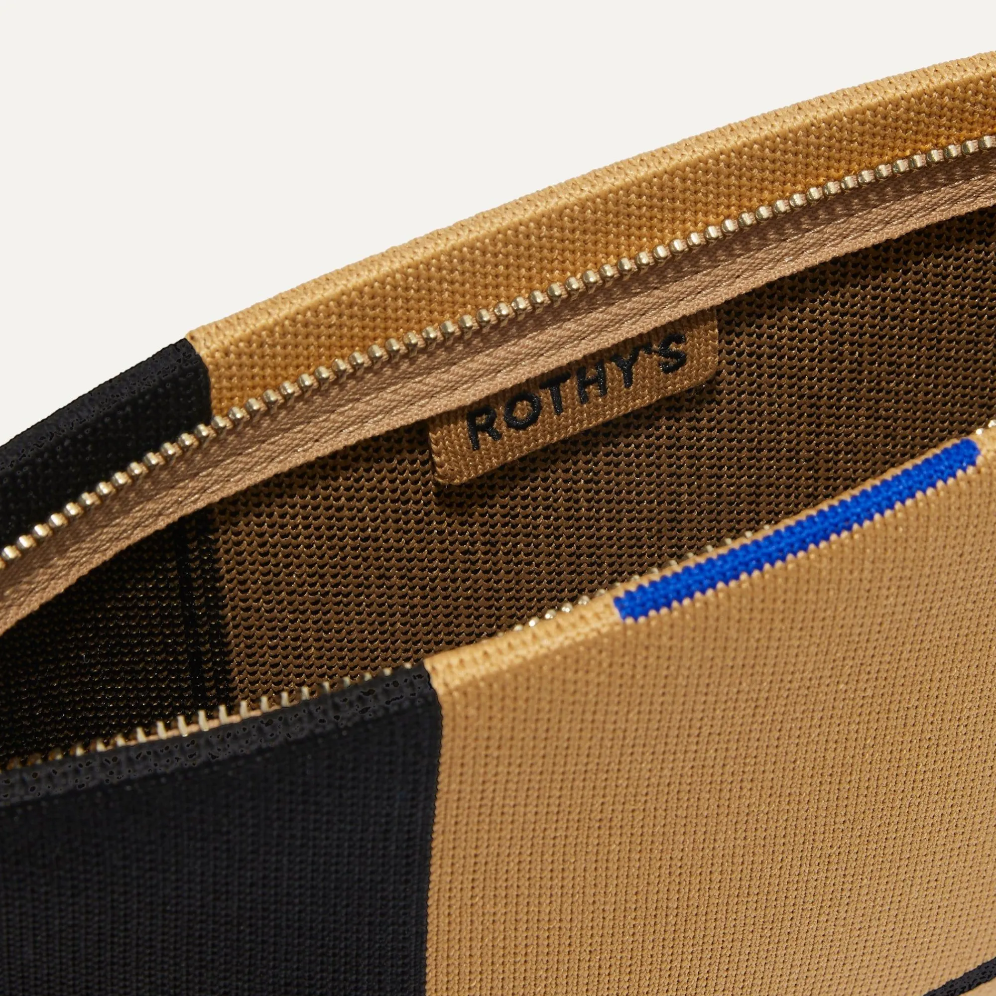 Rothy's Clutches & Pouches^The Wristlet Camel And Black
