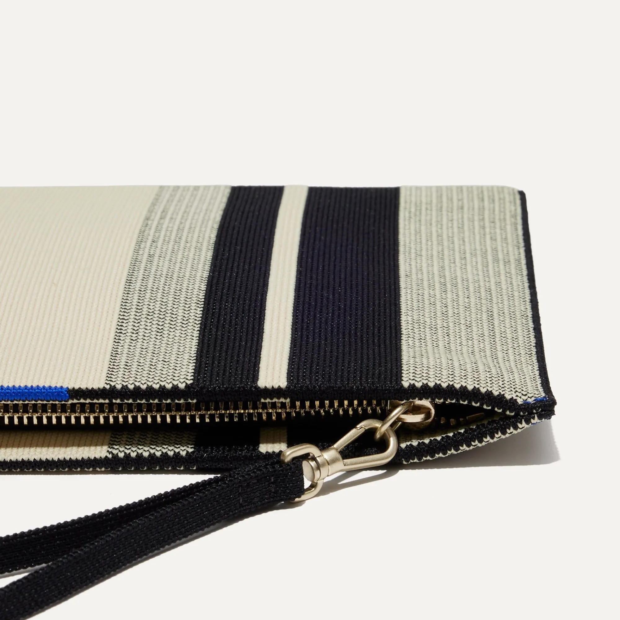 Rothy's Clutches & Pouches^The Wristlet Ivory Rugby Stripe